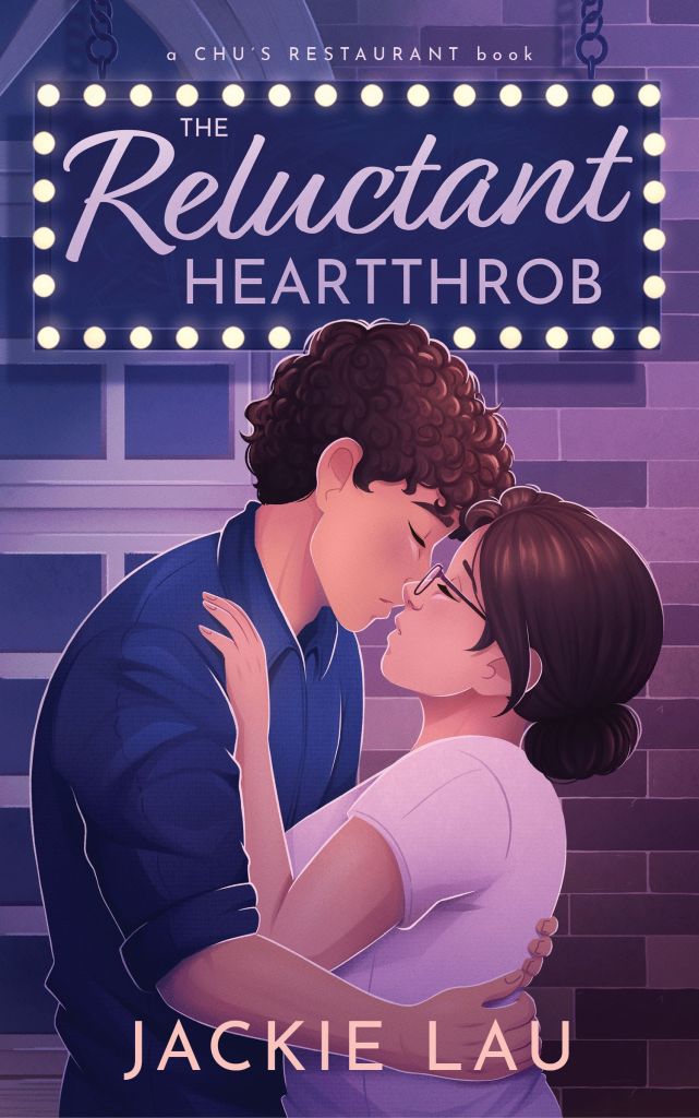 Illustrated cover of The Reluctant Heartthrob by Jackie Lau. Title is at the top, on a dark sign with lightbulbs around the edge. Young Asian man and woman stand below it, embracing and about to kiss. Background: brick building. Colors: lots of blue and purple hues. Nighttime. 